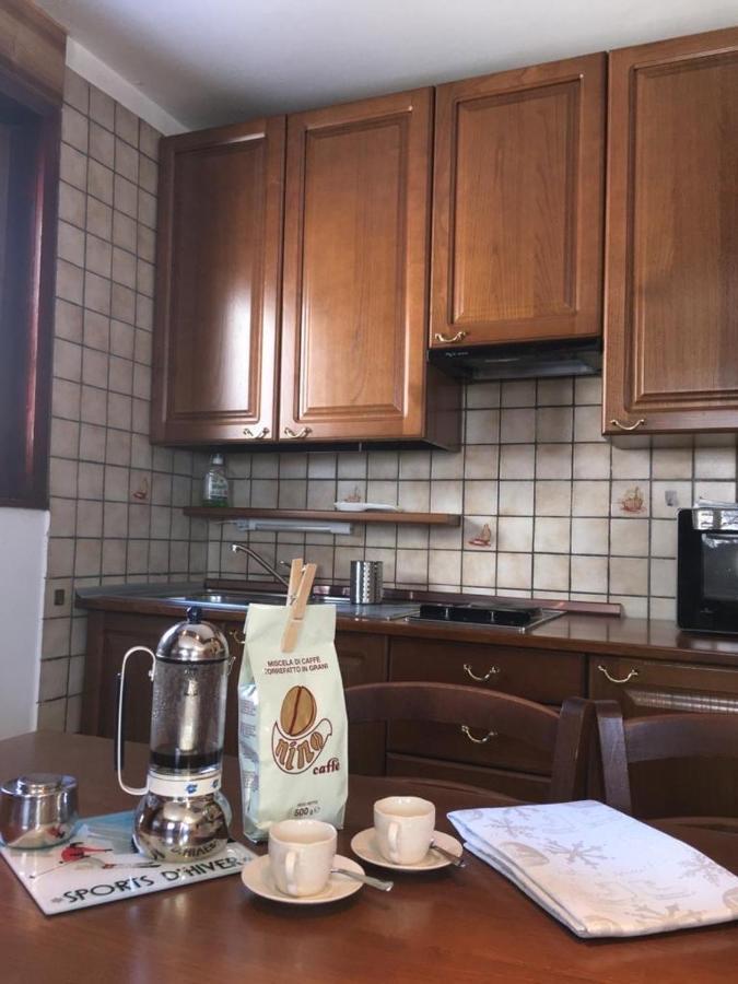 Aroma Di Legno E Profumo Di Neve Apartment เบรยล์-แชร์วิเนีย ภายนอก รูปภาพ